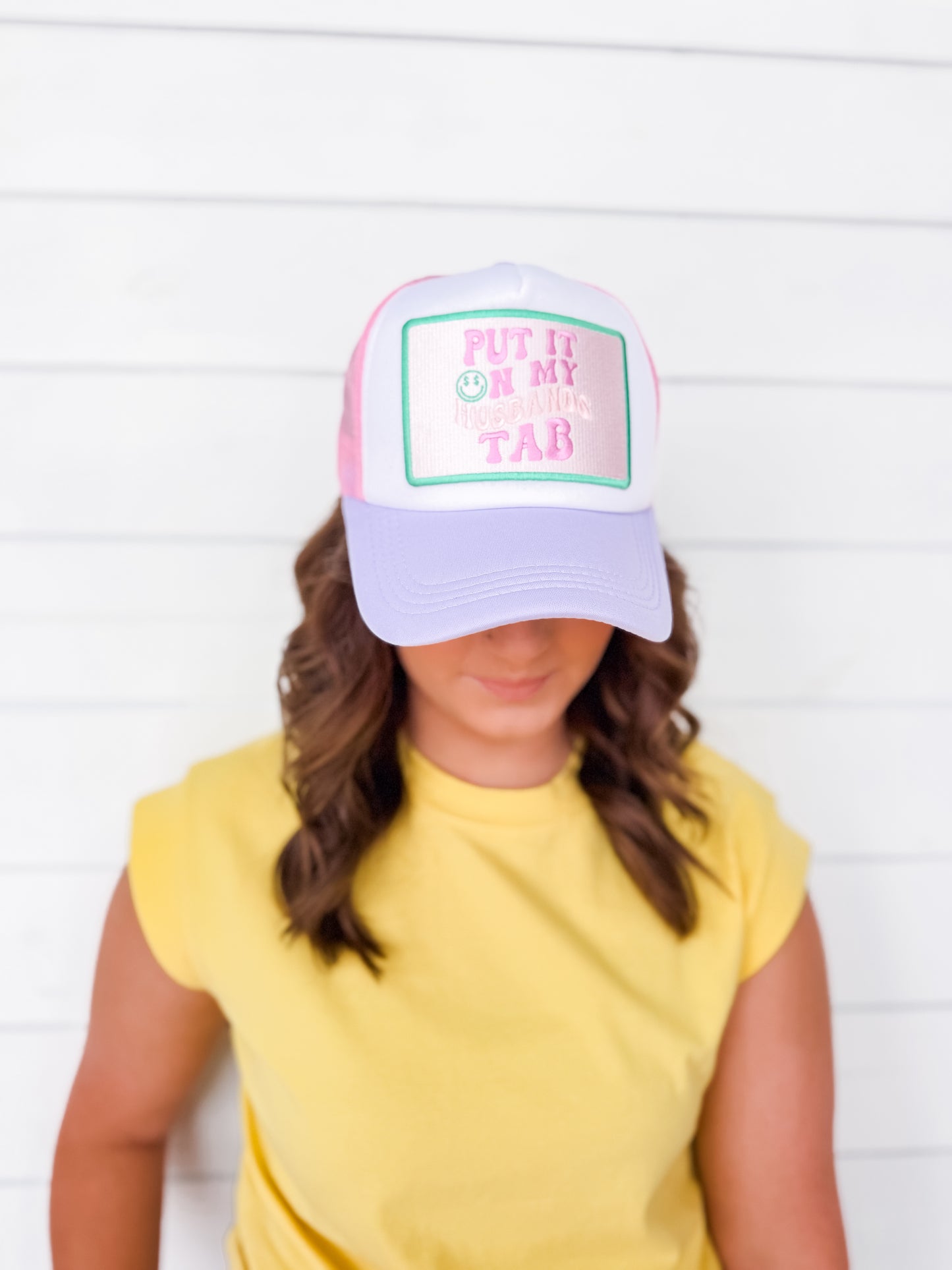 Put It On My Husband's Tab Trucker Hat